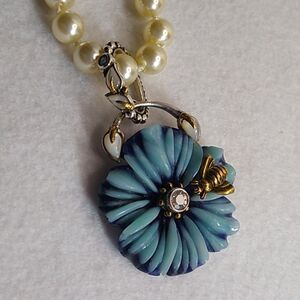 Margaret Thurman's Echo of the Dreamer Floral Enhancer Pendant